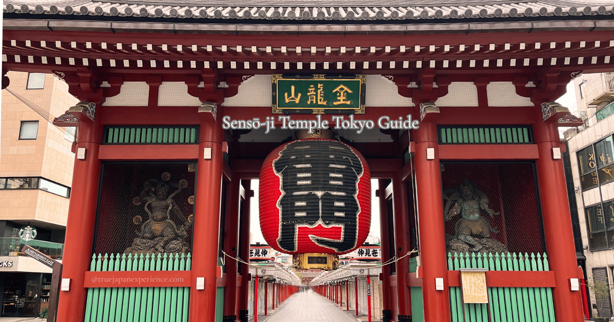 Front view of Kaminarimon Gate at Sensō-ji Temple in Tokyo with a large red lantern and statues of wind and thunder gods on each side, taken early in the morning with few people around.