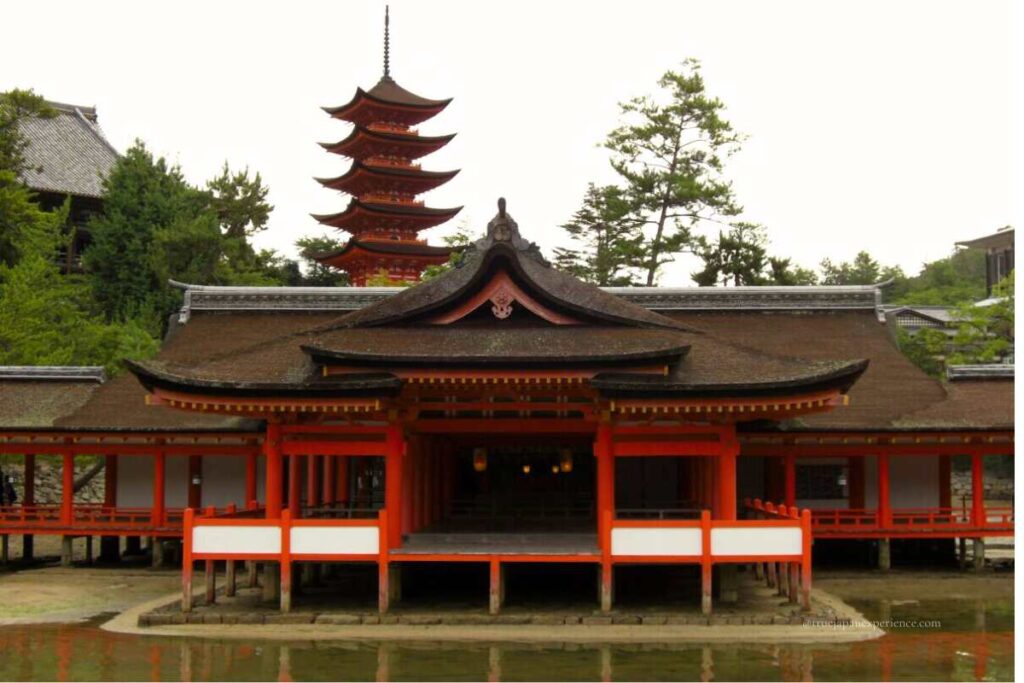 The main worship hall of Itsukushima Shrine with the five-story pagoda in the background, Miyajima Island