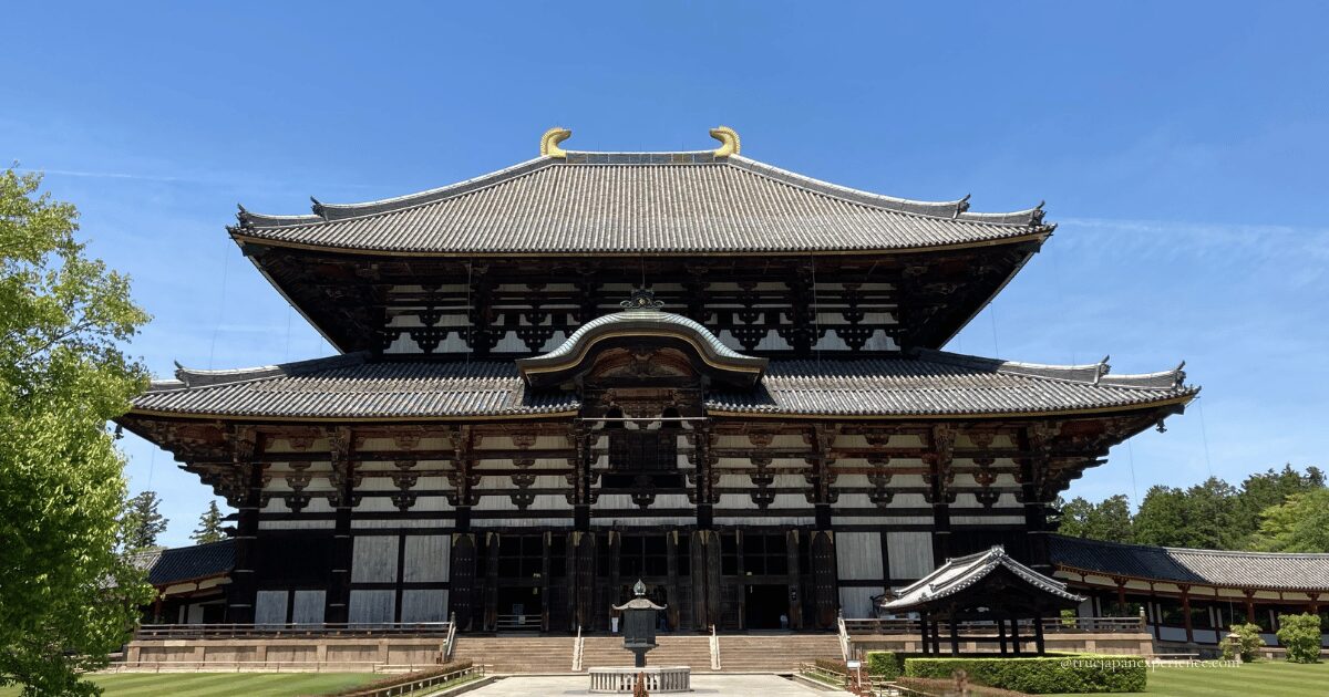 Front view of the Great Buddha Hall at Todai-ji Temple in Nara, Japan, under a clear blue sky