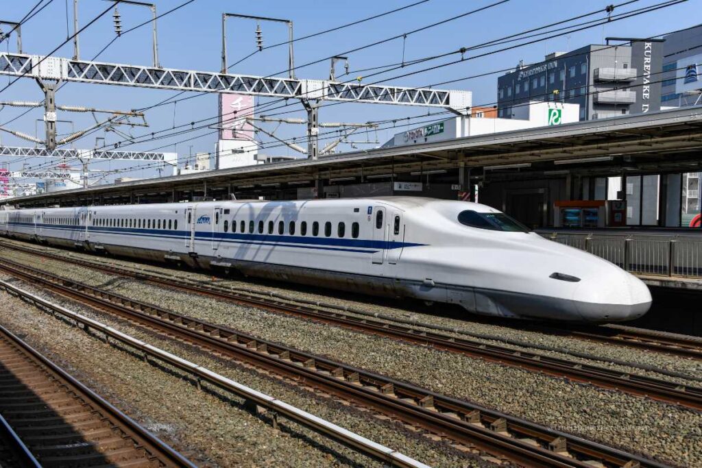 Shinkansen bullet train at a station platform in Japan